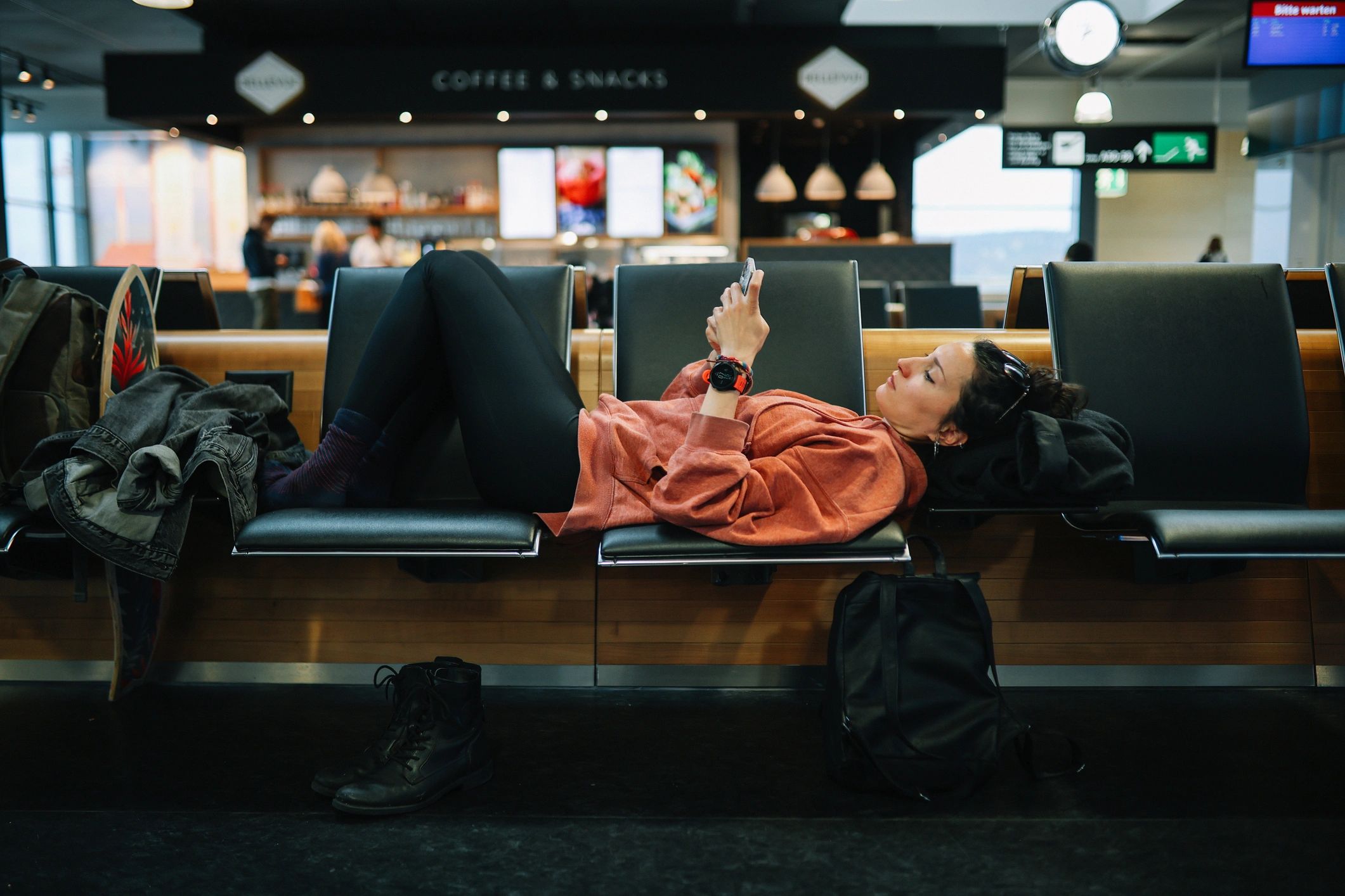 Traveler using smartphone at the airport